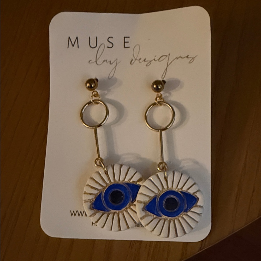 Muse Elegant Gold Stud Earrings